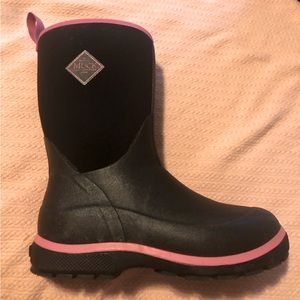 Muck Boots, black with pink trim.